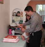Goerge cutting cake