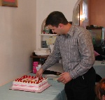 Goerge cutting cake