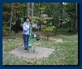Lari at old water pump
